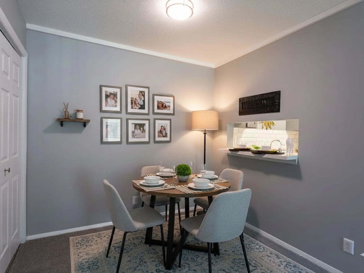 Staged dining nook with kitchen pass-through