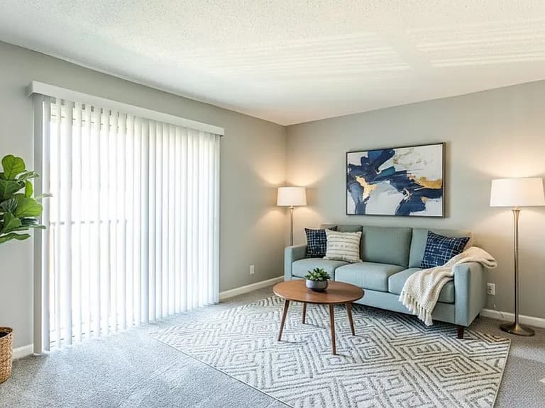 Comfortable staged living room with patio doors